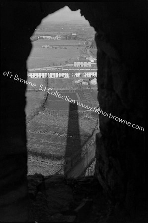 ROUND TOWER VIEWS FROM SHADOW OF TOWER THROUGH N.WINDOW OF TOP STAGE